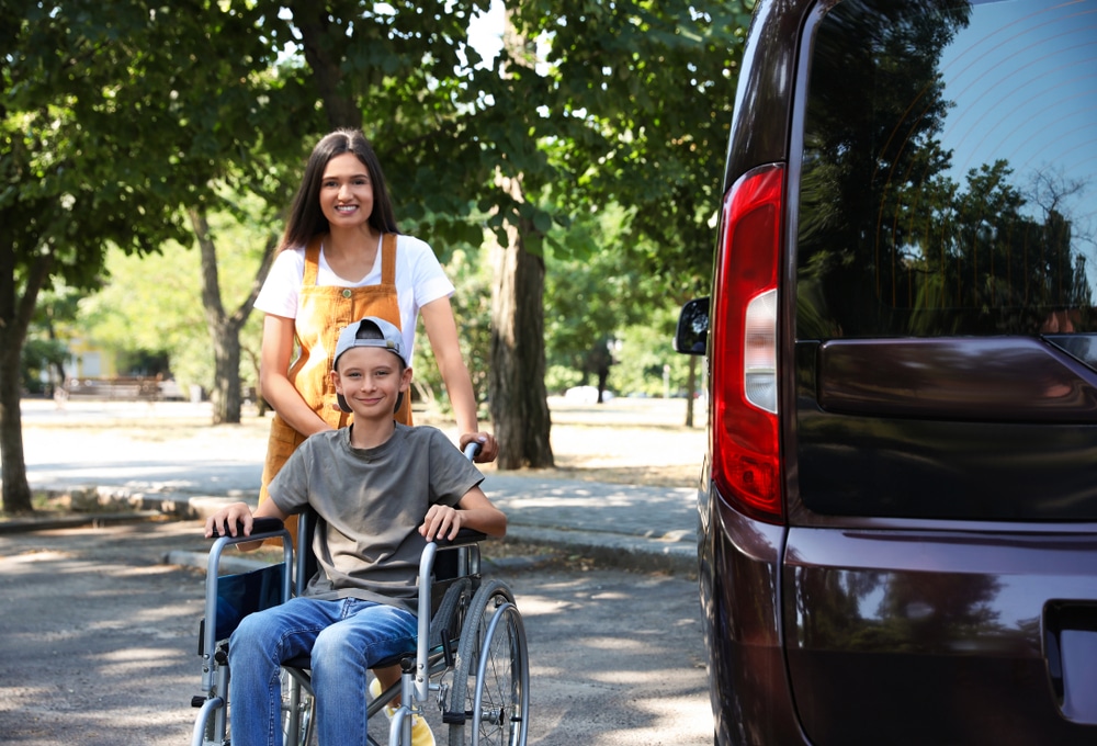 Parent uses accessible parking space because they have a disability parking permit.