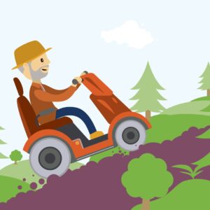 Man sitting in a mobility scooter going up a steep mountain