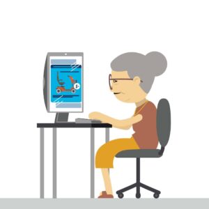 Woman researching mobility scooters on computer