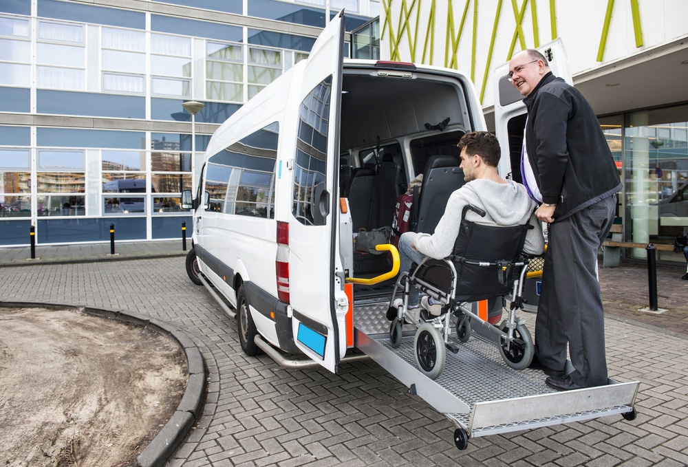 man-in-wheelchair-using-taxi