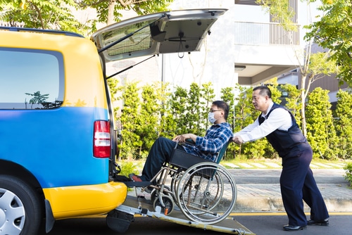 a takes a wheelchair taxi, and benefits from the reduced fare thanks to the taxi subsidy scheme