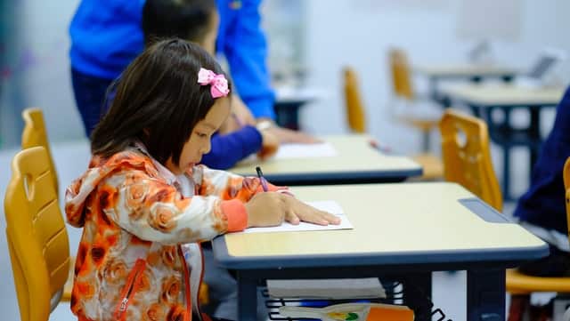 A little girl starts primary school with the support of the NDIS early childhood approach