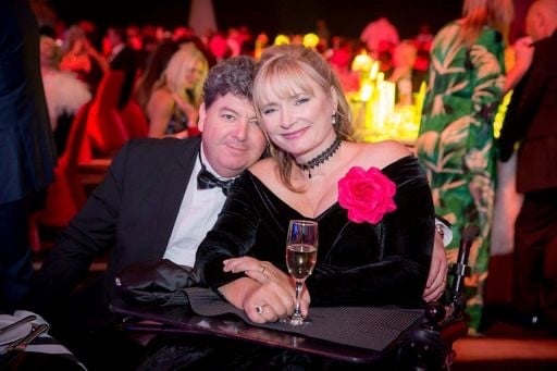 Carol and her husband at the Mercedes-Benz Fashion Festival.