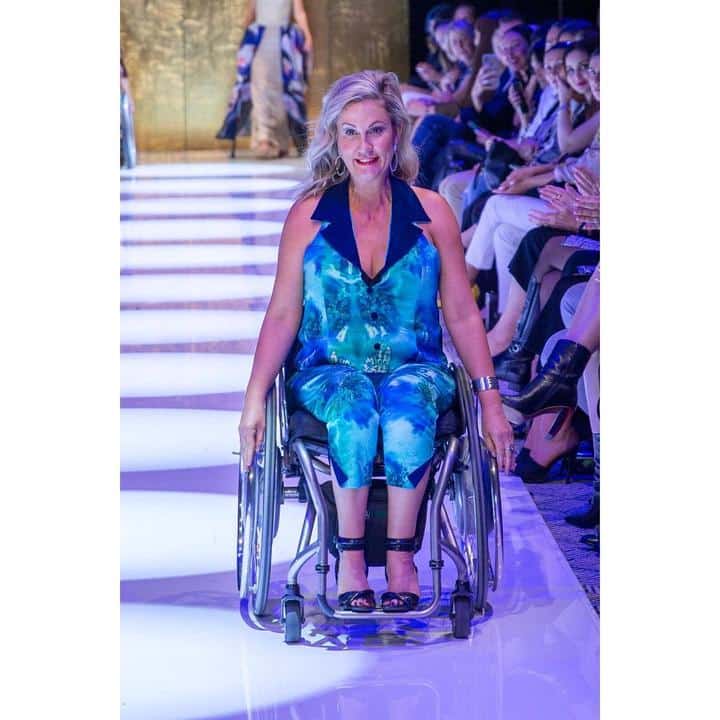 Carol prints her art on her quadriplegic clothing designs. 