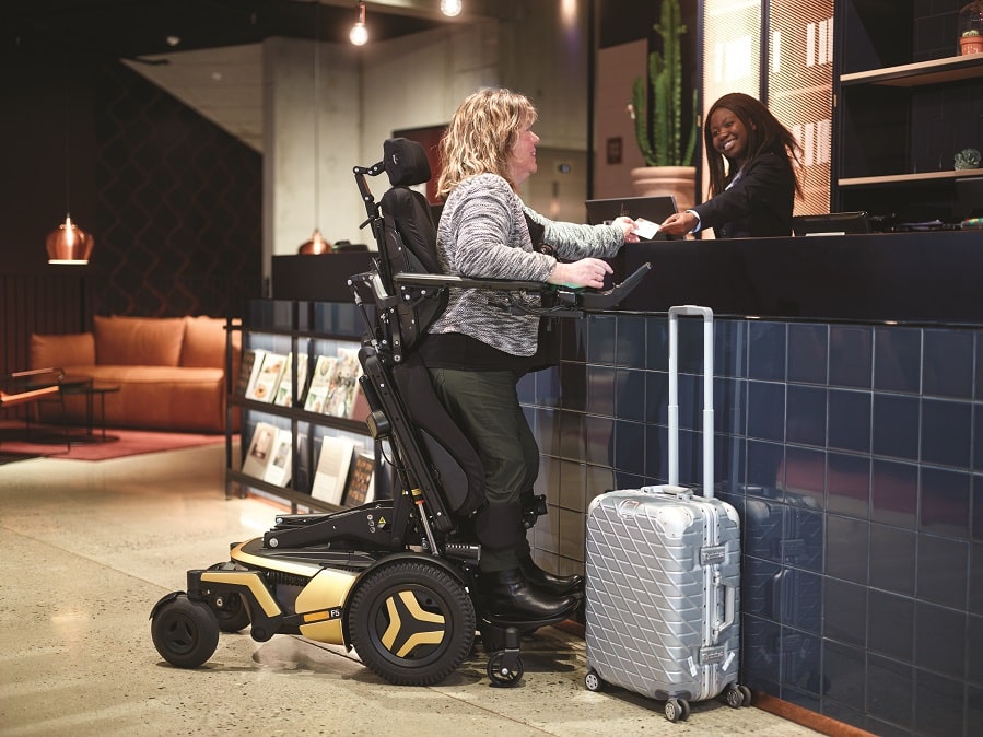 this woman at a hotel desk had insurance for your wheelchair