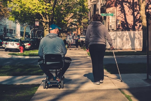 This man is test driving, before buying a mobility scooter.