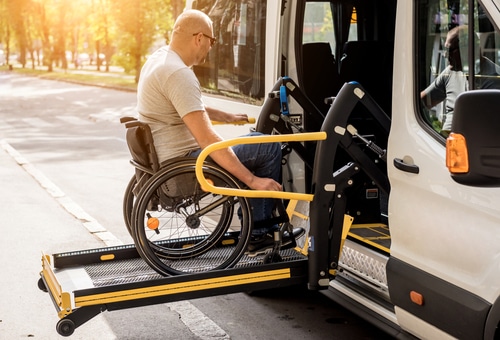 This man is using wheelchair accessible car hire while travelling in another state.