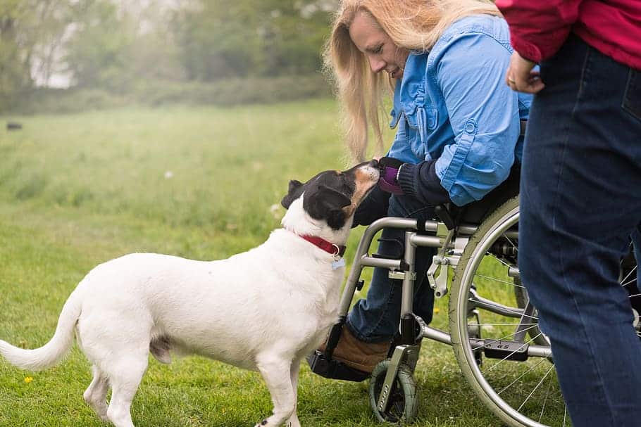 A woman experiences the physical benefits of owning a pet