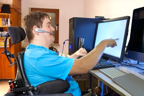 This man has infantile cerebral palsy caused by a complicated birth and he multifunctional wheelchair.