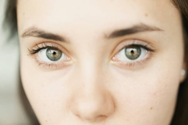 This women is experiencing absence seizure (Petit Mal) and is staring into space. 