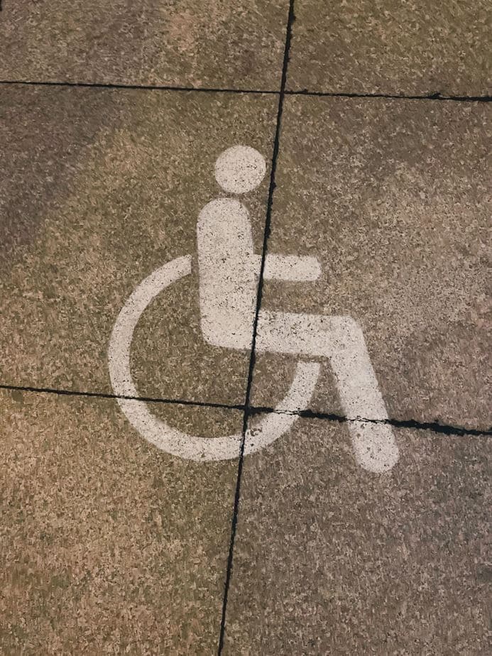 wheelchair symbol on ground to represent mobility scooter registration