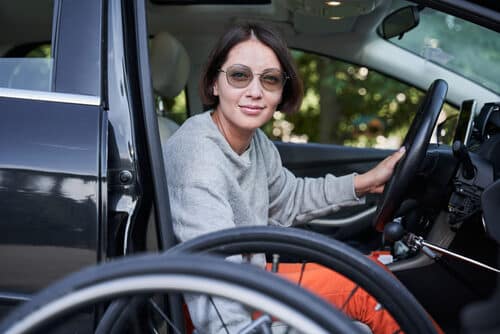 this woman uses a swivel seat for the car