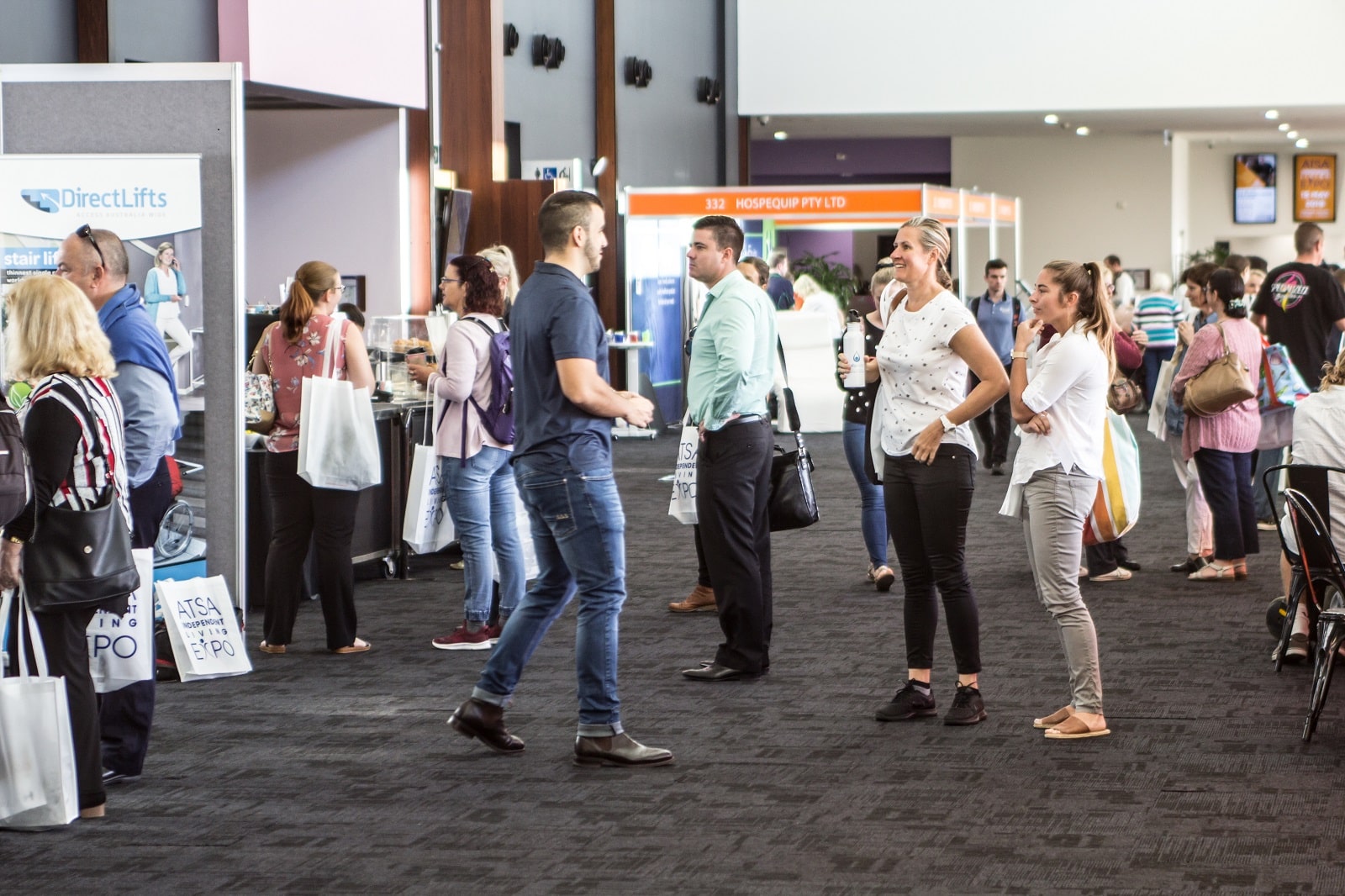 People milling around ATSA independent living expo stands