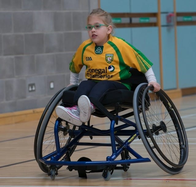 A young girl participates in various disability sport and recreation options