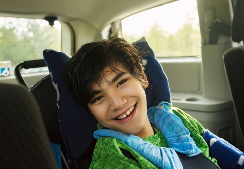 Australian boy travelling in wheelchair accessible van