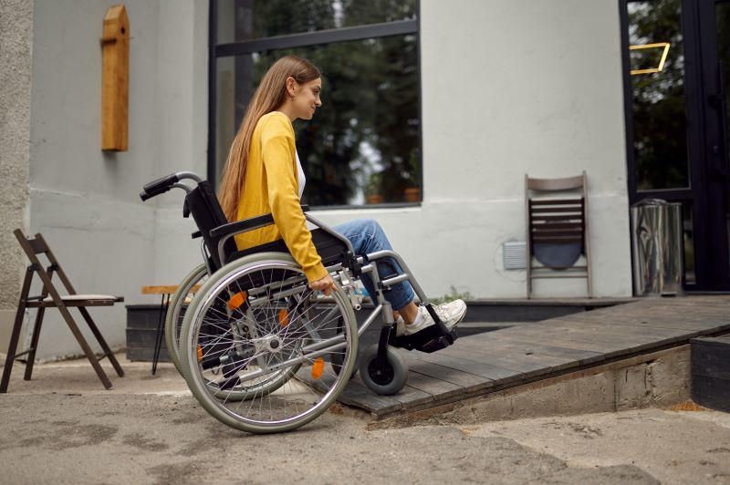 a young Australian uses a wheelchair following a spinal cord injury
