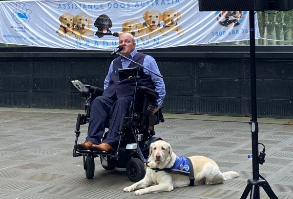 Tim McCallum is the host at the ADA dog graduation ceremony