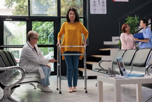 Travelling with a disability, like this lady with a walking frame takes some advanced planning. 