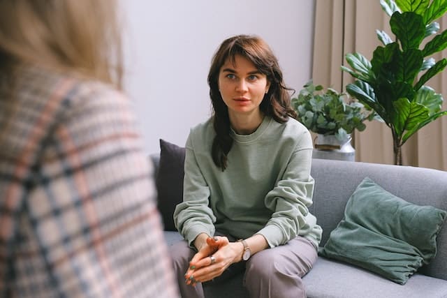 A patient talks to their psychiatrist