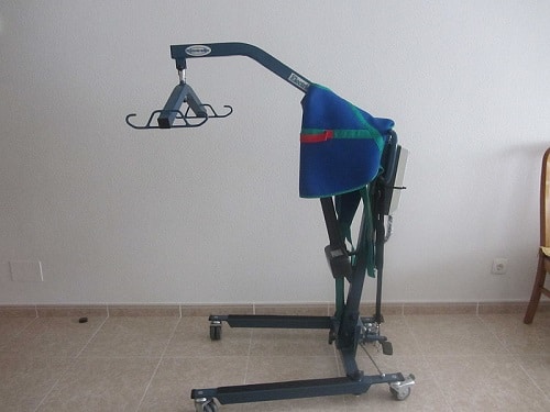 This image shows a sit-to-stand lift or patient lift sling, a type of assistive device designed to lift and transfer individuals with limited mobility from a seated position to a standing position or vice versa.