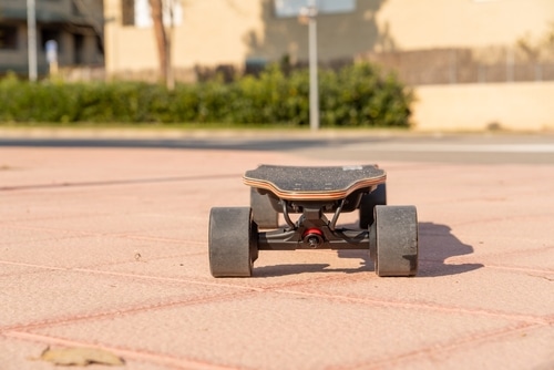 an electric skateboard pictured is now classed with mobility aids for NSW laws for riding footpaths