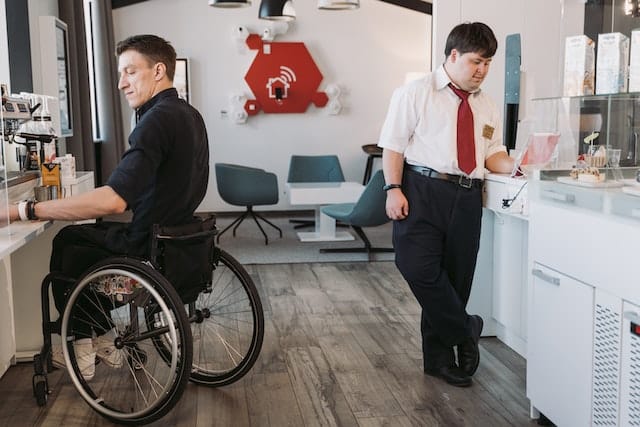 Two employees with a fulltime job at a disability inclusive company help make up the stats in the Australian Disability Strategy