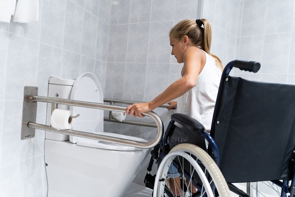 Woman uses disability toilet facilities that she has 24/7 access to with her MLAK key