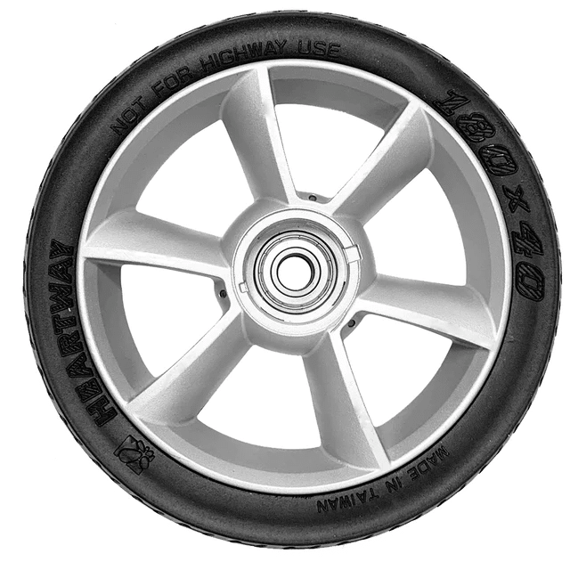 black mobility scooter wheel on its own against white background