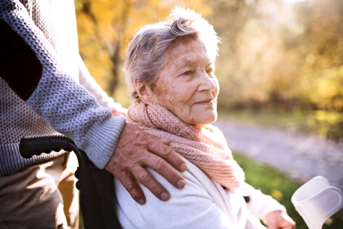 An elderly stroke survivor. Adjusting to a wheelchair after stroke can be challenging