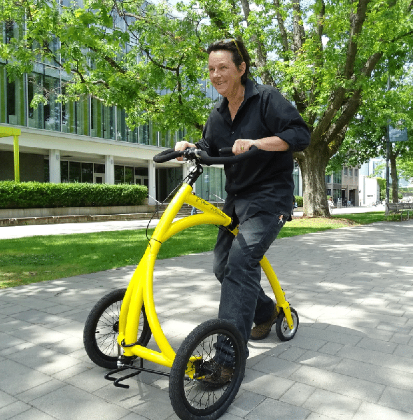 An image of someone using an Alinka walking-bike