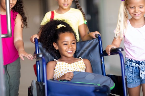 A group of young girls in wheelchairs attended the Source Kids Disability Expo.