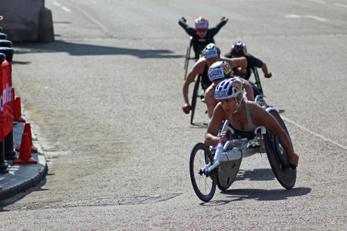 New York, NY - November 7, 2021: Winner of 1st place of Women professional wheelchair athletes of 50th TCS NYC marathon Madison de Rozario poses at finish line in Central Park