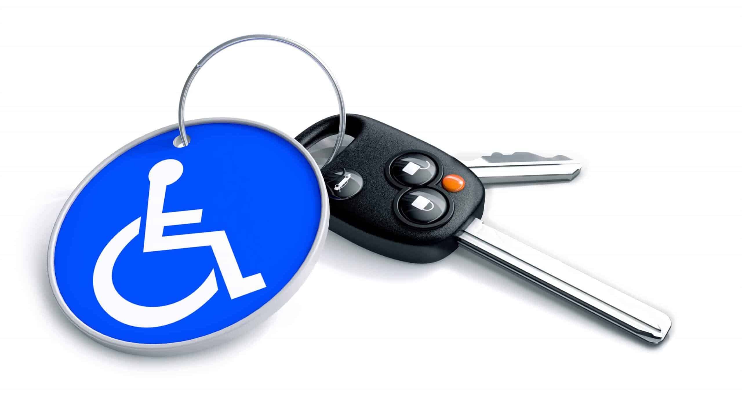 A set of car keys with a disability parking sign symbolises the topic: do car insurance companies discriminate against people with disabilities?